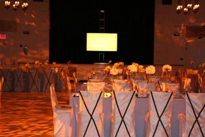 Dining setup in Buttenweiser Hall with screen