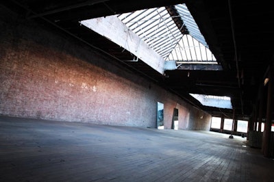 Two natural daylight skylights with exposed brick wall background