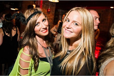 Happy party girls strike a pose at Urban Daddy's Twenties Throwback Party