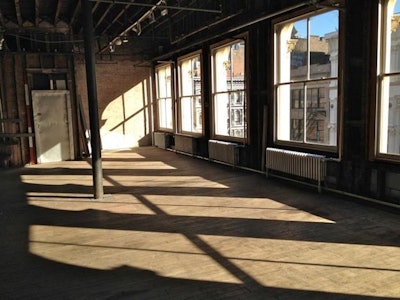 Industrial loft, natural daylight, eastern and western light, exposed brick walls