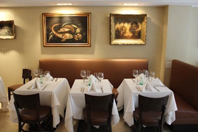 Enjoy your meal in the dining room while admiring the artwork