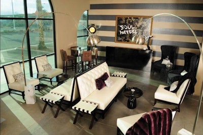 Las Vegas showroom vignette with Haddington white sofas with black trim and chairs