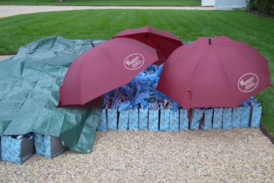 At the Traditional Home Hampton Designer Showhouse, clever event organizers used sponsor-supplied umbrellas from Paramount Homes of the Hamptons to shield gift bags from the drizzle, and got more exposure for the builder of the house in the bargain.