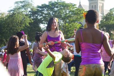 Sunshine Reggae Band limbo at 2014 Festival of Life in Union Park