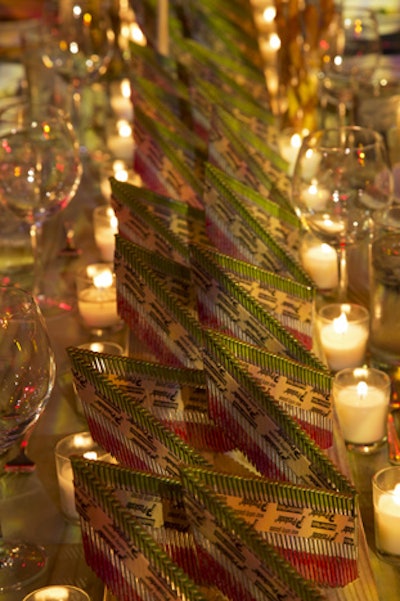 Sheets of nails were arranged in a chevron pattern to create a functional and eye-grabbing table centerpiece.