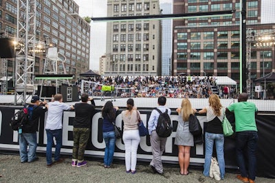 Although the court was not open to the public—only those with a Nike+ account could book a time to play—passersby could watch from seating inside the pop-up or from the exterior.