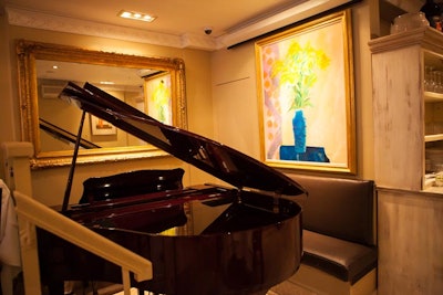 The dining room features a grand piano and live music on Friday and Saturday nights
