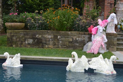Take a close look at these swans, they are made of fabric flowers. I loved them floating in the pool at the Pet Philanthropy Circle's Pet Hero Awards.