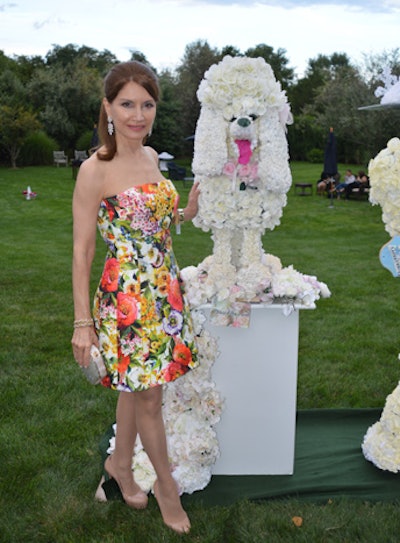 And here is Pet Hero Jean Shafiroff (it was one of two animal events she headlined this summer!) with a flower poodle. I just thought these things were so funny.