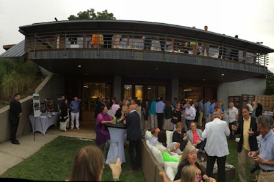 I didn’t stick around to see what got staged on the tiny platform outside the South Fork Natural History Museum's event—I assumed dessert or something—but I love when events have things go on at different times at different parts of the venue. As you can see, this place has these magnificent windows and decks, and then later the party moved down the stairs and into a swinging tent.