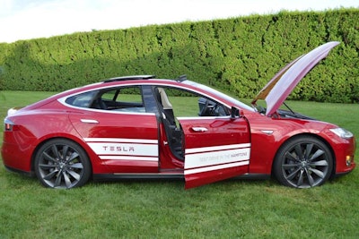 But I was more interested in the red one with racing stripes at the Ellen Hermanson Breast Cancer Center of Southampton Hospital event. Lots of events have display cars on deck in the Hamptons, but the idea of a test-drive as an auction item is clever. The carmaker gives away something it’d likely give away for a fee if you walked into the dealership, the charity gets the money from the prize, and the event gets a nice shiny object for the guests to ogle.