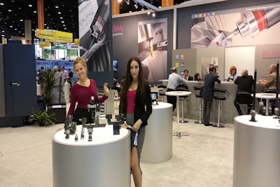 Trade show models working the ITMS show in Chicago