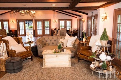 Leather wingback armchairs and vintage trunks make any lounge vignette perfect for cocktail hour.