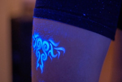 UV blacklight temporary tattoo in electric blue