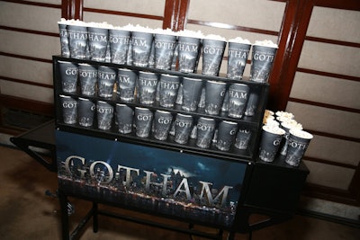 Branded carts held cups of popcorn for guests to grab before they took their seats for the screening.