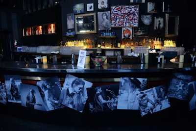 Black-and-white shots of musicians lined the bar at Create Nightclub.