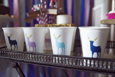 Add festive decorations to inexpensive paper cups or office mugs with waterproof reindeer stickers, $8 for a sheet of six, from the Oh Goodie Designs & Events Etsy shop.