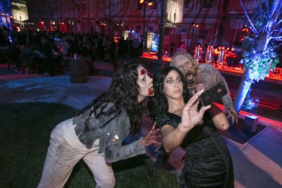 At the after-party for The Walking Dead’s Season 4 premiere in Los Angeles in October 2013, costumed zombies posed for photo ops with guests.