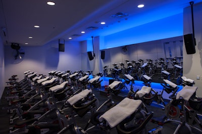 The Austin-based fitness studio Ride Indoor Cycling offers intense indoor cycling during 45-minute sessions, with 36 Schwinn bikes surrounded by brightly colored LED lighting. The downtown studio is available for corporate sessions as well as complete buyouts.