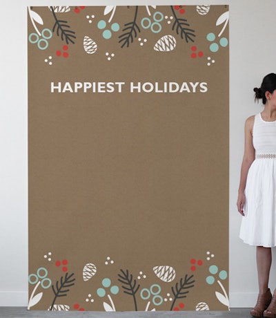 Set up a photo backdrop like the holiday-theme, kraft-paper-inspired one from Minted, $230, to capture team pictures. The backdrop comes with five grommets for hanging or can be mounted to a wall using removable poster tape.
