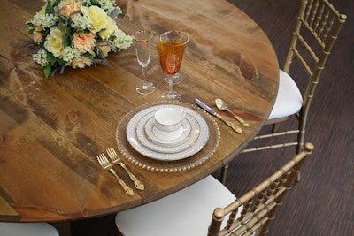 Classic Party Rentals' will be rolling out a fall look, which features its new Marcella china pattern dishware and its 66-inch round farm table, gold Chiavari chairs, gold beaded charger, diplomat flatware, gold Venice glassware, and amber wine glasses. The rental house also carries large patio heaters for chilly outdoor events.