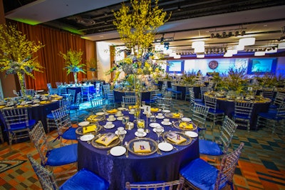 Use blue tablecloths to add a pop of color to your corporate event
