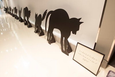 Along the path to the in-office Leo Burnett bash, which had a bad-luck theme, designers from Art of Imagination placed black paper cat cutouts on the walls of the hallway.