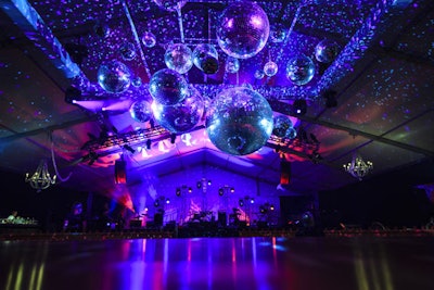 A slew of hanging disco balls added a Studio 54-style vibe to the pop-up concert venue.
