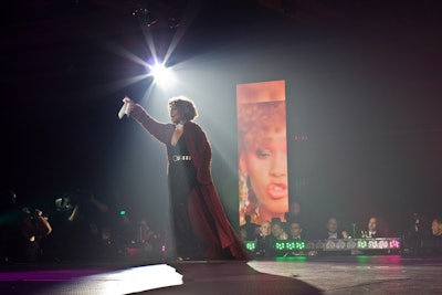Tasha Long, a female impersonator, performed as Whitney Houston as part of the event’s theme of “Legendary.” Additional impersonators performed as Bette Midler, Dolly Parton, and Cher.