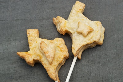 The locally sourced goods at Tiny Pies come in a variety of sizes, including the individually wrapped titular three-inch pies, Mason jar pies, and customizable pie pops in either blueberry or cherry, available in the shape of Texas (pictured). The 12-pack boxes and Mason jars can be personalized.