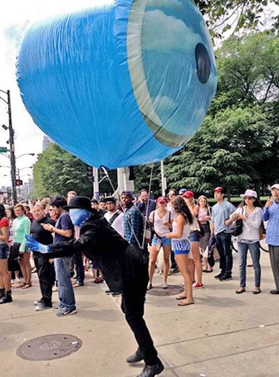 The Art Institute of Chicago turned to experiential marketing agency All Terrain to create a guerrilla activation to attract attention to the museum's René Magritte exhibit. The company recreated the cloud eye from the artist's famed 'The False Mirror' and took it to several summer art festivals, where attendees could snap shots with the piece.