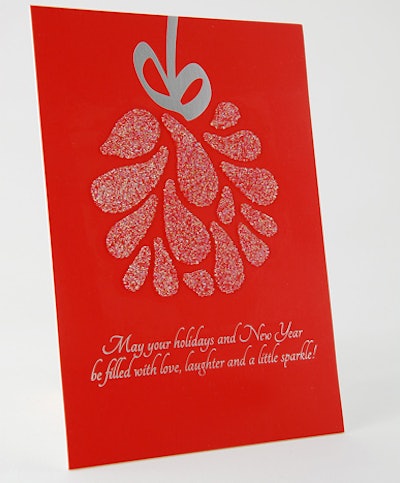 Dazzle customers and clients with Swarovski crystal fabric-embellished cards from RedBliss Design. The sparkly die-cut design forms a mistletoe ball against a cheery red background, along with a silver foil holiday message. Pricing available upon request.