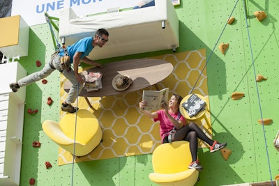 Ikea furniture decorated the wall and served as handy rest stops for those making the climb.
