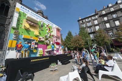 Organizers placed chairs in front of the 30-foot wall for those who preferred to watch rather than participate in the spectacle.