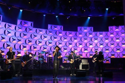 Tim McGraw performs in front of Chadz panels on Ellen