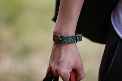 Organizers provided each guest with a leather bracelet containing an R.F.I.D. chip. The bracelet served as an entry ticket and also as the sole form of payment at the festival. Attendees could load money onto their bracelets before the event and also add to it at “top up” stations throughout the grounds.