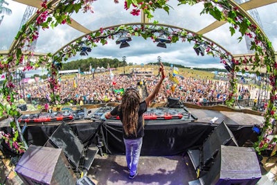 Greenery and flowers framed the DJ booth at the main stage.