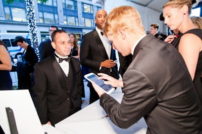 Given the night's host, it was only fitting that check-in for LG's Art of the Pixel gala was done using smart devices. The organizers also covered signage on the building's façade (the landmark is owned by the consumer appliances company Haier and bears the brand name on its exterior) with a bold banner designed to evoke a museum opening.