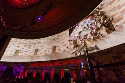 As evening progressed with the product reveal and winner announcement, organizers built momentum with the video projections on the walls of the elliptical space. To give the work of the competition's finalists the most weight, the producers used 3-D mapping to simulate rocks being chiseled.