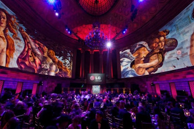 The event's producers designed the projections for the venue's walls to match the progression of the evening. As guests sat for dinner, the walls showcased the student artwork in ornate frames; during the entrée, the evening's longest course, the walls displayed classic artwork—including Botticelli's 'The Birth of Venus'—interspersed with quotes from the students.