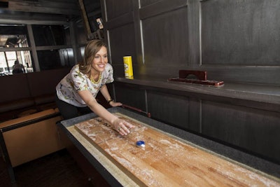 Brand new shuffleboard game keeps your guests playing during your event