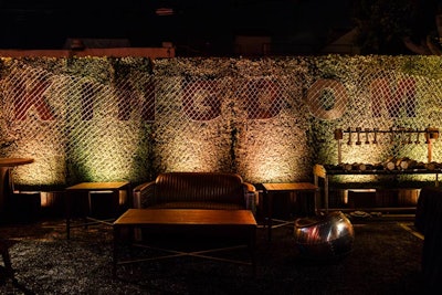 Hedging defined the party space, which was actually a transformed parking lot.