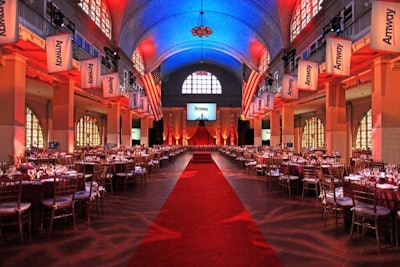 A red carpet entrance at Ellis Island