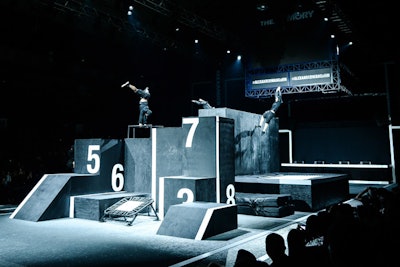 The event's full-on energy was evident from the get-go. Acrobats-cum-free runners propelled down from the ceiling and out of the shadows for a parkour performance choreographed by AntiGravity's Christopher Harrison.