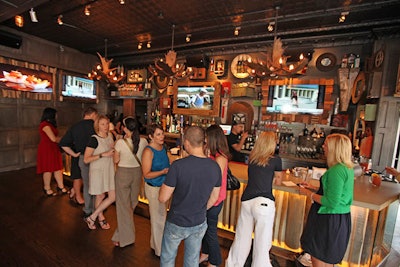 The downstairs bar is a lively space for groups with full service bar and TVs