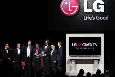 On stage LG executives showcased the brand's new televisions and announced the winners of its Art of the Pixel competition. That included (pictured, left to right) judge Mark Tribe, LG director of new product development Tim Alessi, LG head of marketing Dave VanderWaal, runner-up Joseph Bui, grand prize winner John Summerson, president of LG Electronics U.S.A. William Cho, and LG Art of the Pixel ambassador and M.C. Neil Patrick Harris.