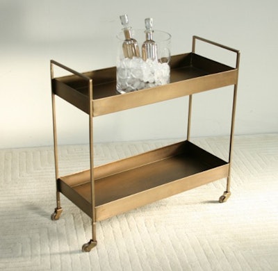 Antique brass bar cart, $395, available in the New York, Washington, and Boston from Bridge Furniture & Props