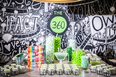 A candy bar—modeled on the company's own candy-stocked kitchen—stuck to the green theme. Guests could fill their own jam jars with treats.