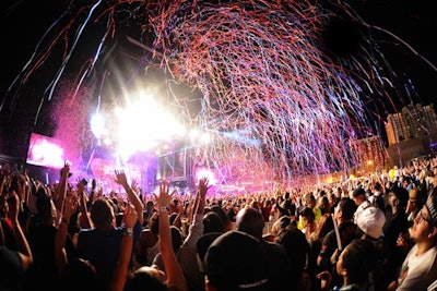 About 550 pounds of confetti showered the 90,000-person crowd during the Life Is Beautiful festival in downtown Las Vegas.