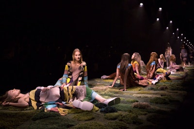 Following the runway finale of the Villa Eugenie-produced Dries Van Noten show, the models leisurely sat down on the more than 300-foot-long runway carpet in the form of hipster nymphs, allowing show attendees the opportunity to get a close-up look at the garments.